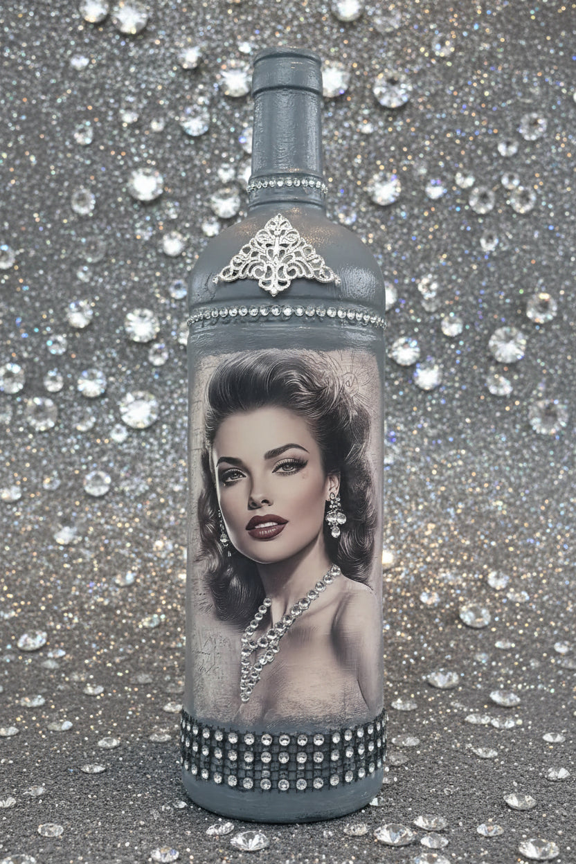 Decorative jeweled bottle with vintage lady portrait and rhinestone band
