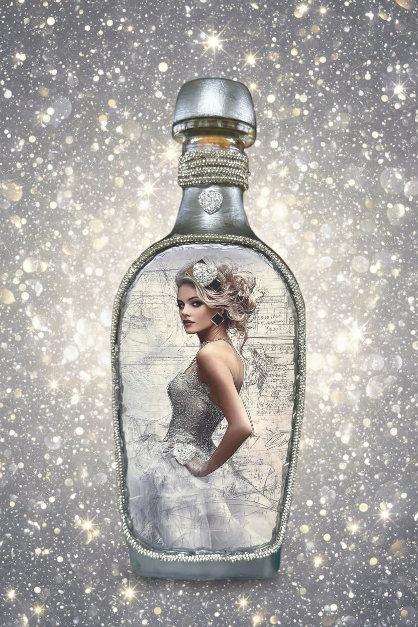 Perfume bottle with silver cap and frosted glass body, front label