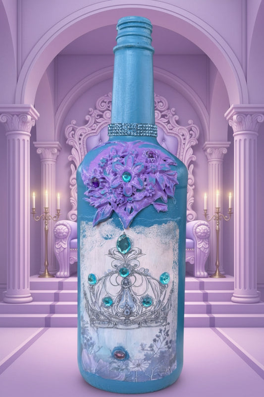 Decorative teal bottle with purple ornate floral label and gem-like accents.