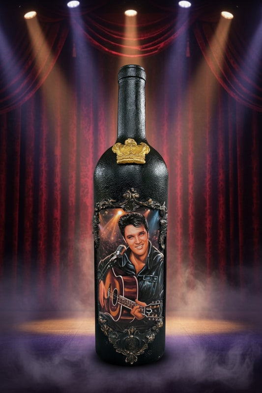 Elvis black glass bottle with gold crown and Elvis portrait graphic, ornate detailing